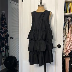 Black sleeveless knee length fluffy dress